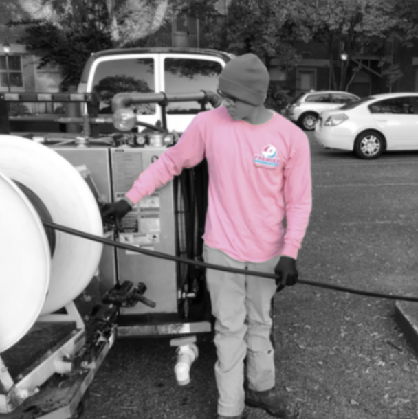 Premier plumber running a hydro jetter